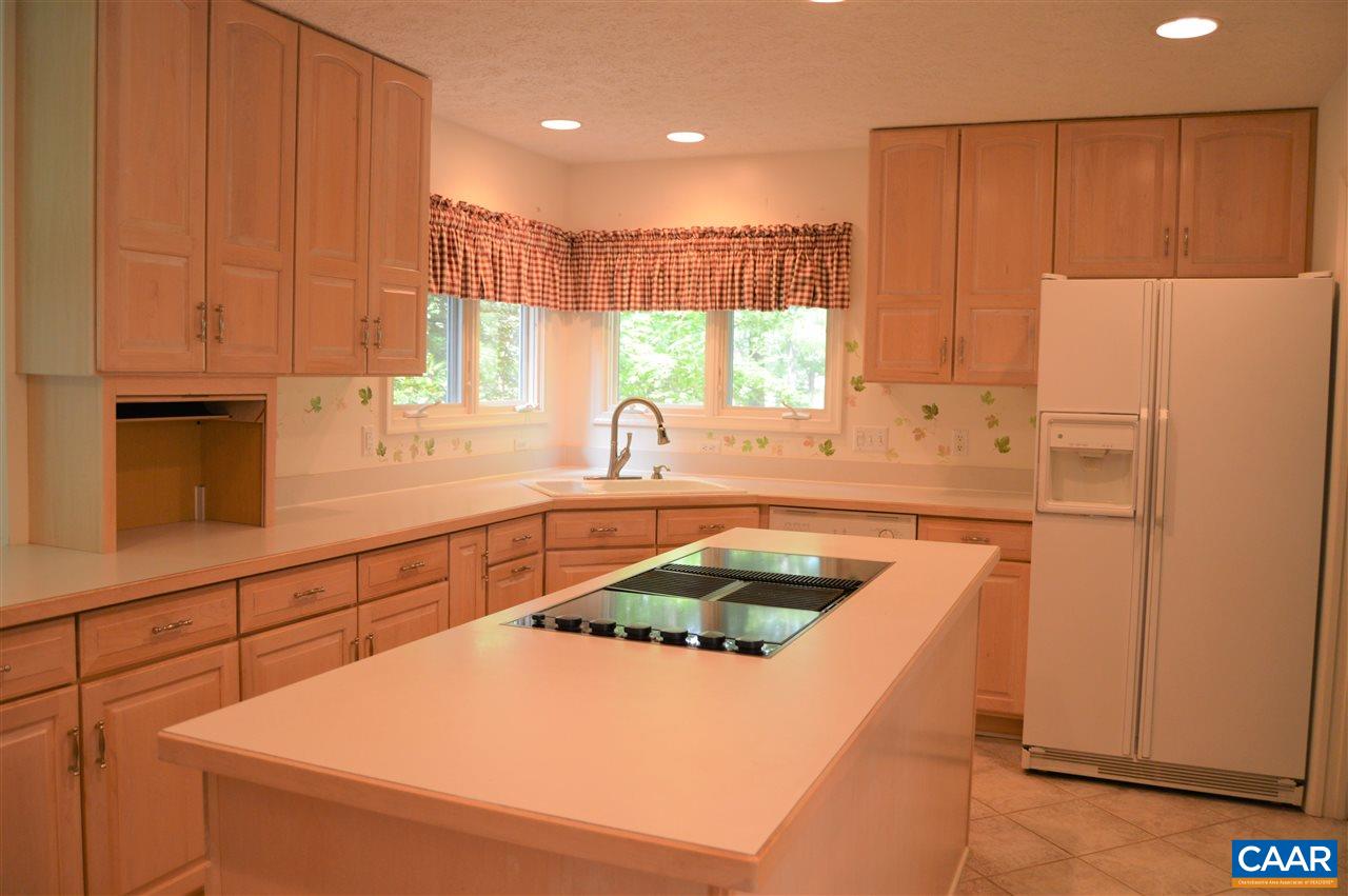 17 Oak Grove Road Palmyra, VA 22963 - Photo 8 of 24 a kitchen with granite countertop a sink a stove and refrigerator