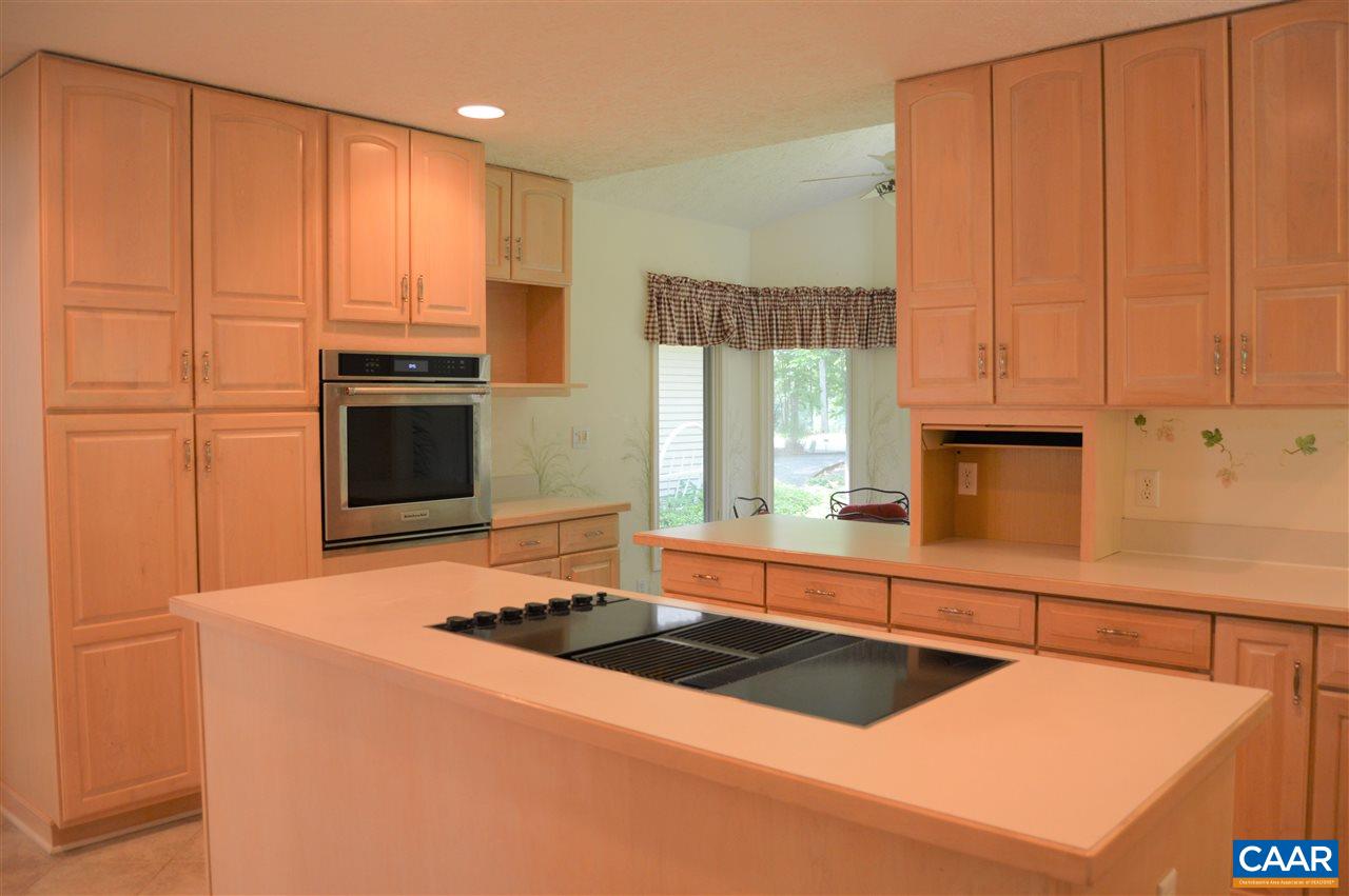 17 Oak Grove Road Palmyra, VA 22963 - Photo 9 of 24 a kitchen with a sink a stove and cabinets