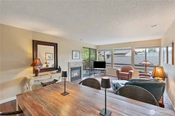 a bedroom with furniture and a fireplace
