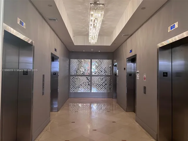 a view of a garden with a building in the background