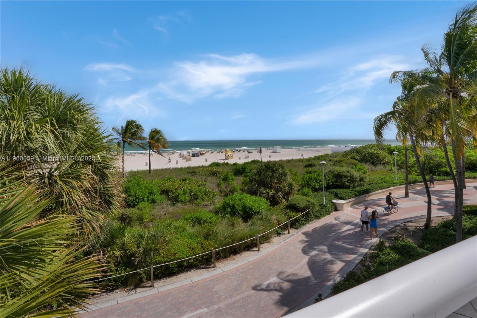 100 Lincoln Road, Unit 607 Miami Beach, FL 33139 - Photo 28 of 30 a view of a garden with a building in the background