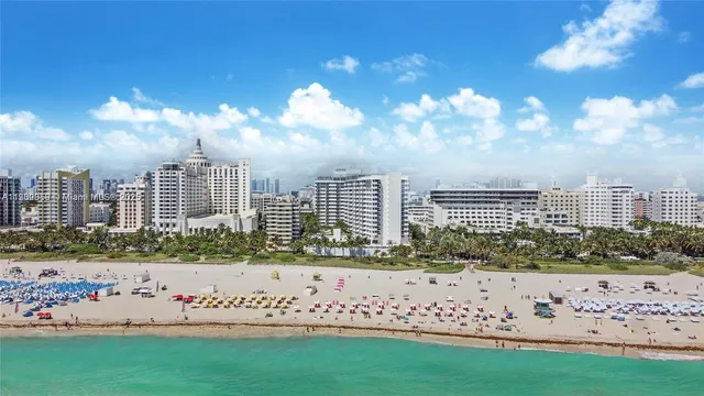a view of a chairs and table in a balcony