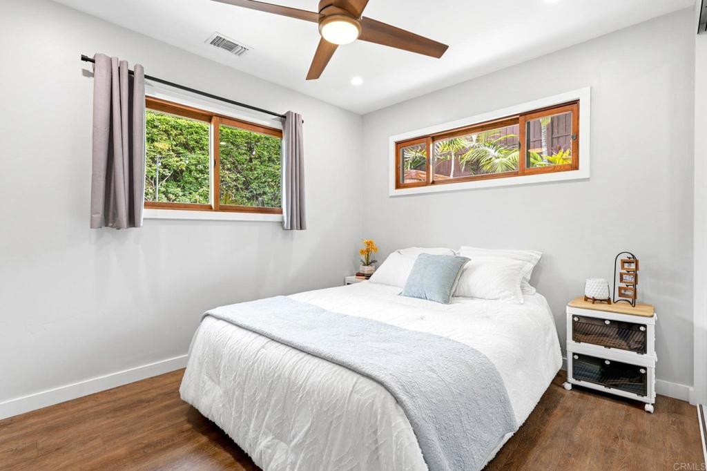 637 Sparta Drive, Unit A & B Encinitas, CA 92024 - Photo 19 of 58 a bedroom with a bed and a window