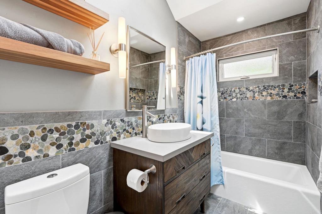 637 Sparta Drive, Unit A & B Encinitas, CA 92024 - Photo 21 of 58 a bathroom with a sink toilet and shower