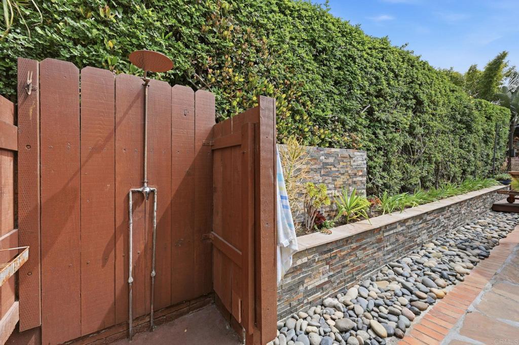 637 Sparta Drive, Unit A & B Encinitas, CA 92024 - Photo 35 of 58 a view of a pathway of a wooden fence