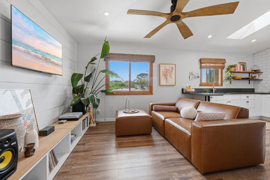 637 Sparta Drive, Unit A & B Encinitas, CA 92024 - Photo 40 of 58 a living room with furniture and a couch