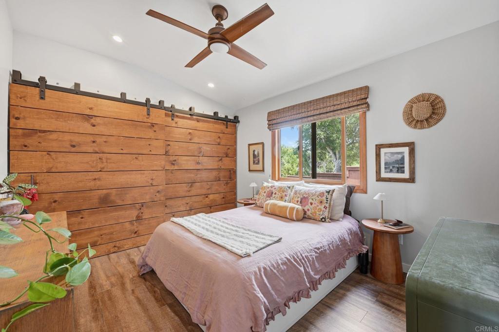 637 Sparta Drive, Unit A & B Encinitas, CA 92024 - Photo 44 of 58 a bedroom with a bed and a window