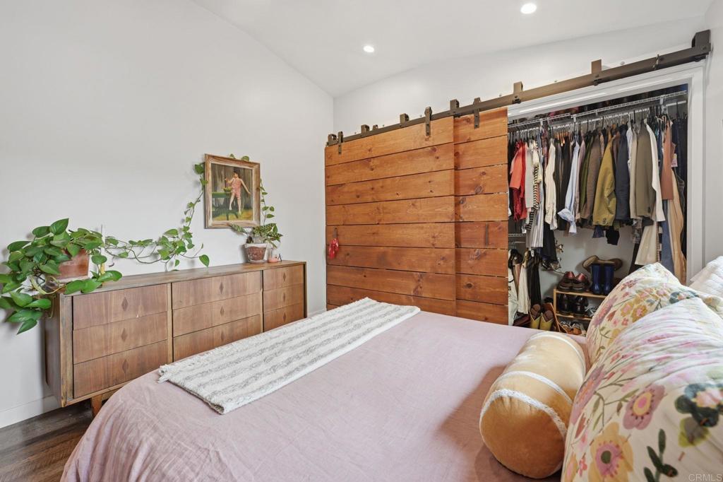 637 Sparta Drive, Unit A & B Encinitas, CA 92024 - Photo 45 of 58 a bedroom with a bed and a closet