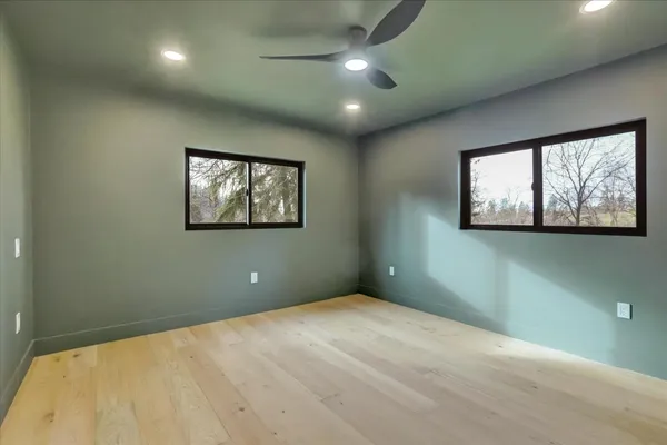 a backyard of a house with lots of green space