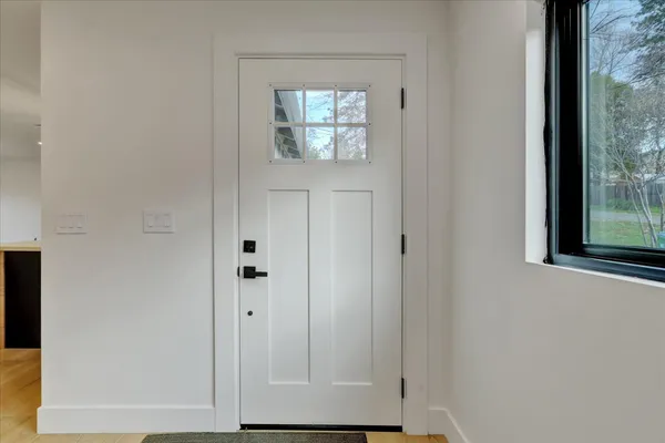 a kitchen with a sink and a refrigerator