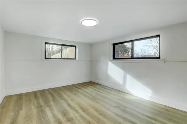 a house with trees in the background