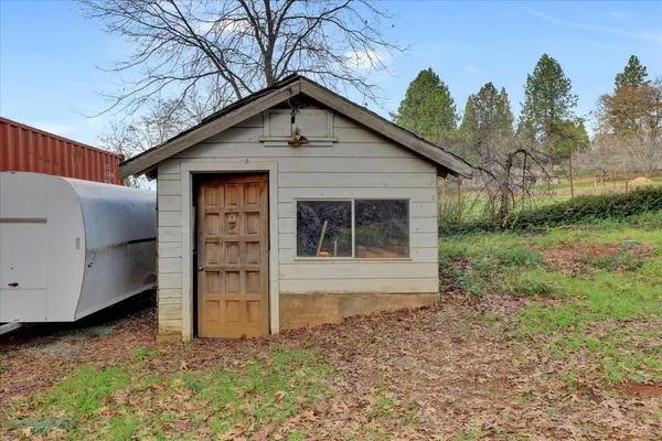 a house view with a outdoor space