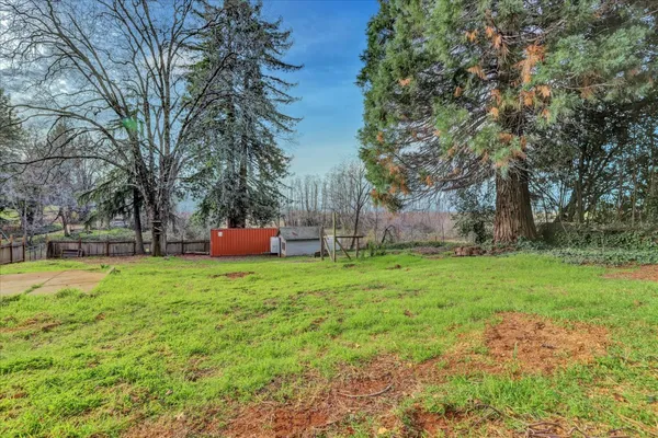 a view of backyard with green space
