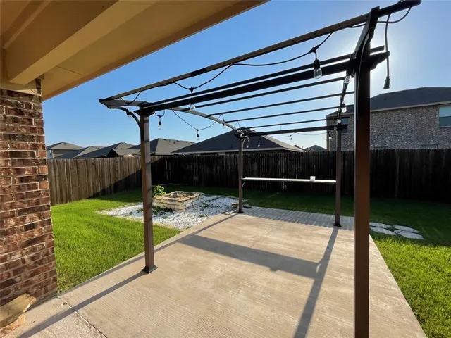 a view of backyard with green space