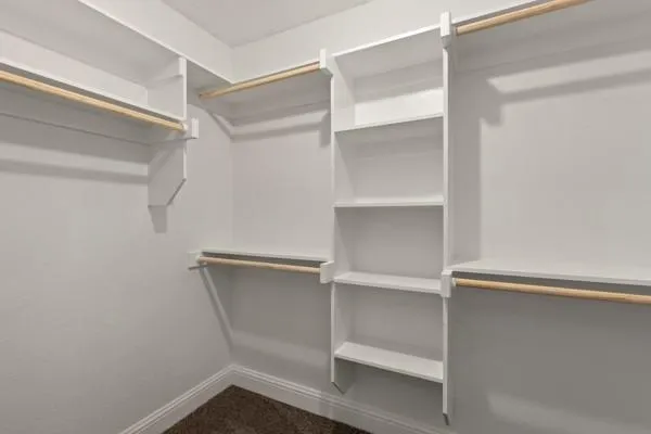 a view of an empty walk in closet