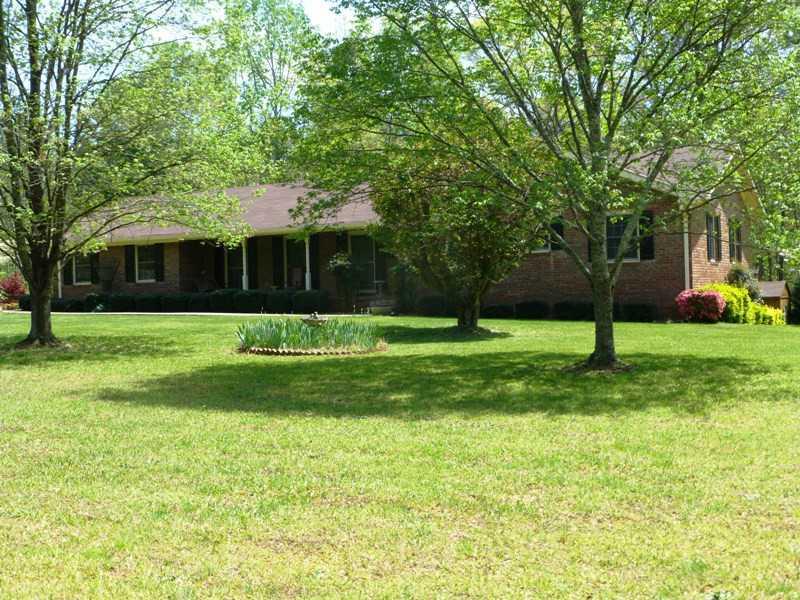 3623 Rollins Road Cumming, GA 30040 - Photo 1 of 1 Exterior Front. A classic brick ranch on 10 Acres.