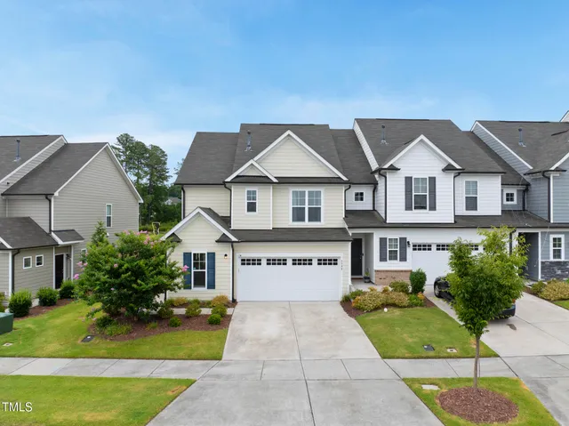 a house view with a garden space
