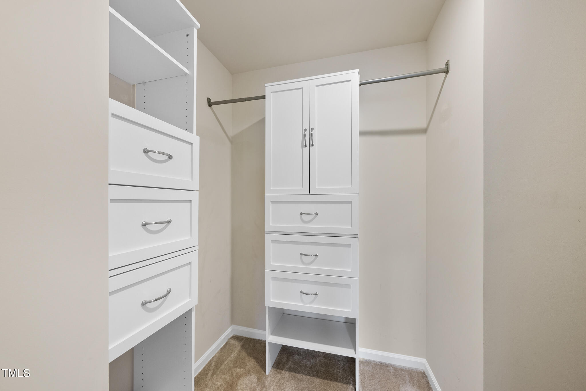 5340 Faulkner Street Durham, NC 27560 - Photo 20 of 31 a view of walk in closet with empty racks