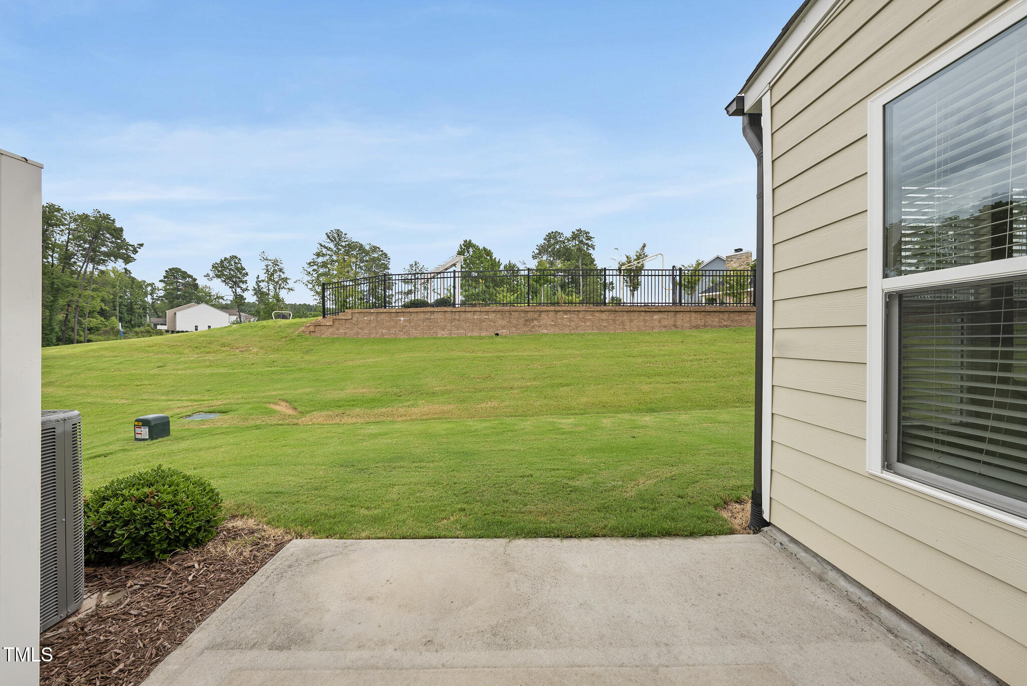 5340 Faulkner Street Durham, NC 27560 - Photo 22 of 31 a view of a golf ground with huge green field and large trees