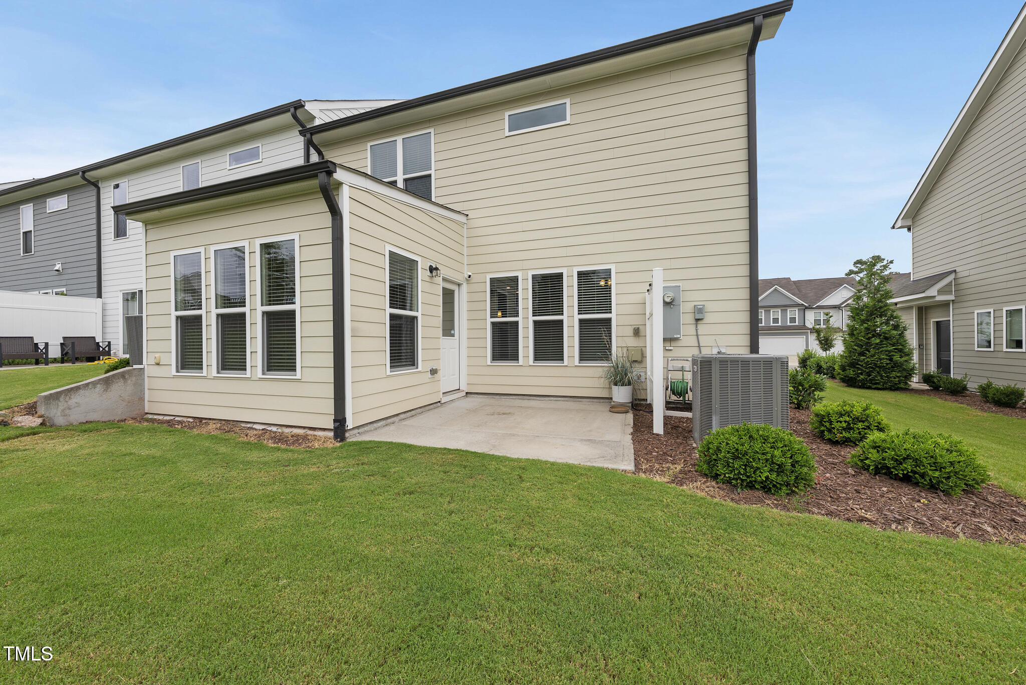 5340 Faulkner Street Durham, NC 27560 - Photo 23 of 31 a view of a house with a yard and porch