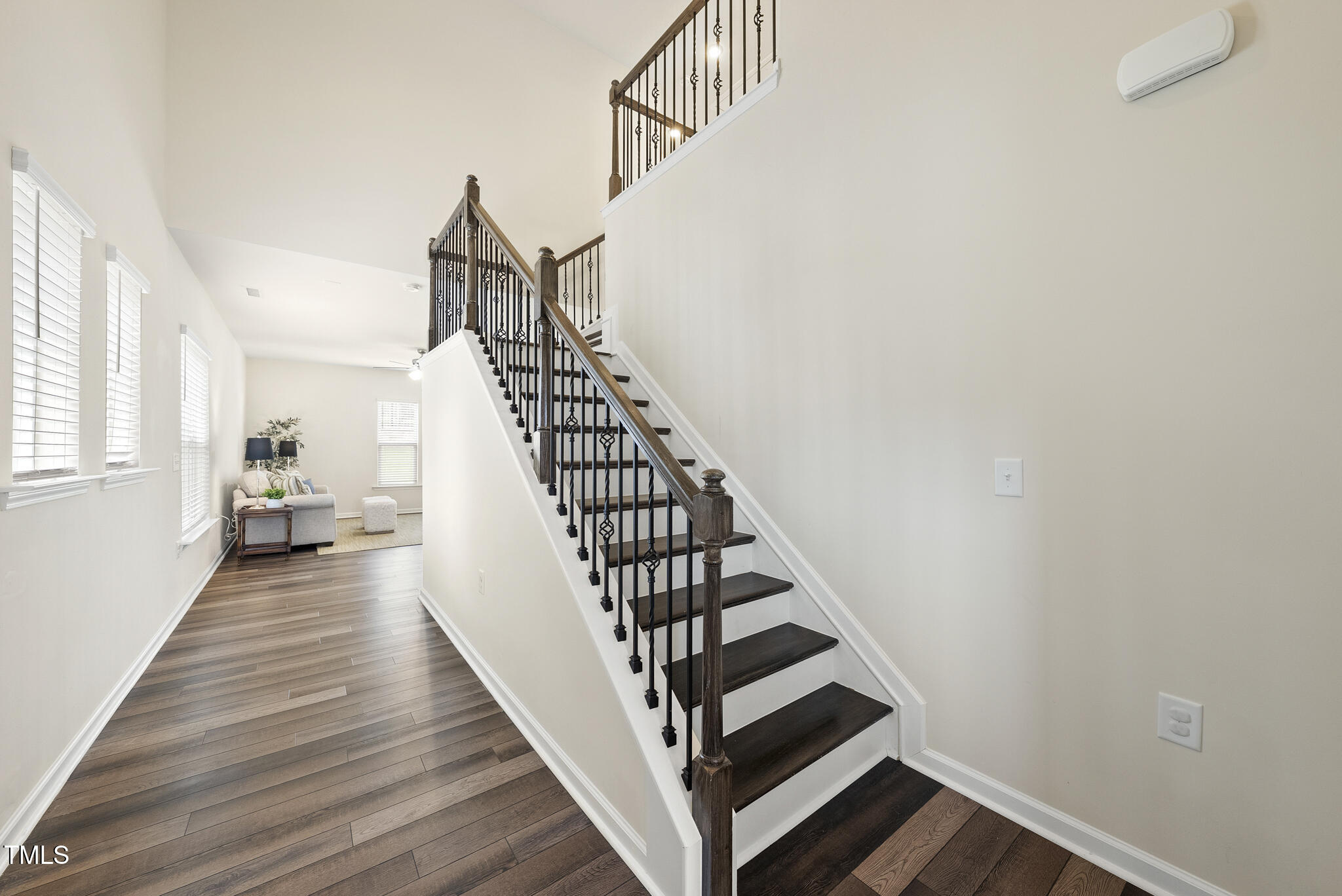 5340 Faulkner Street Durham, NC 27560 - Photo 5 of 31 a view of entryway and hall with wooden floor