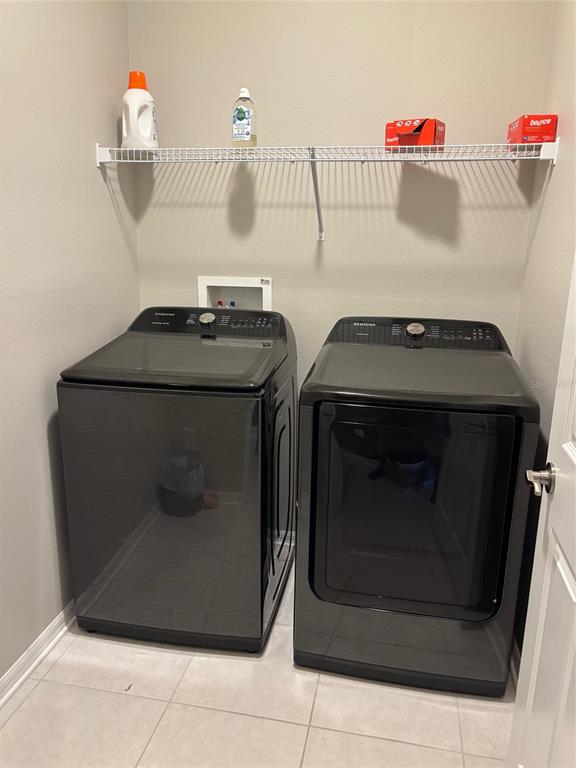 10915 79th Street East Parrish, FL 34219 - Photo 15 of 27 a utility room with dryer and washer