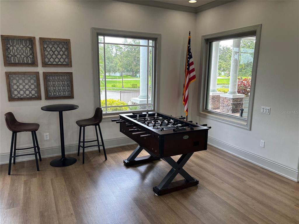 10915 79th Street East Parrish, FL 34219 - Photo 22 of 27 a view of a workspace with furniture and a window