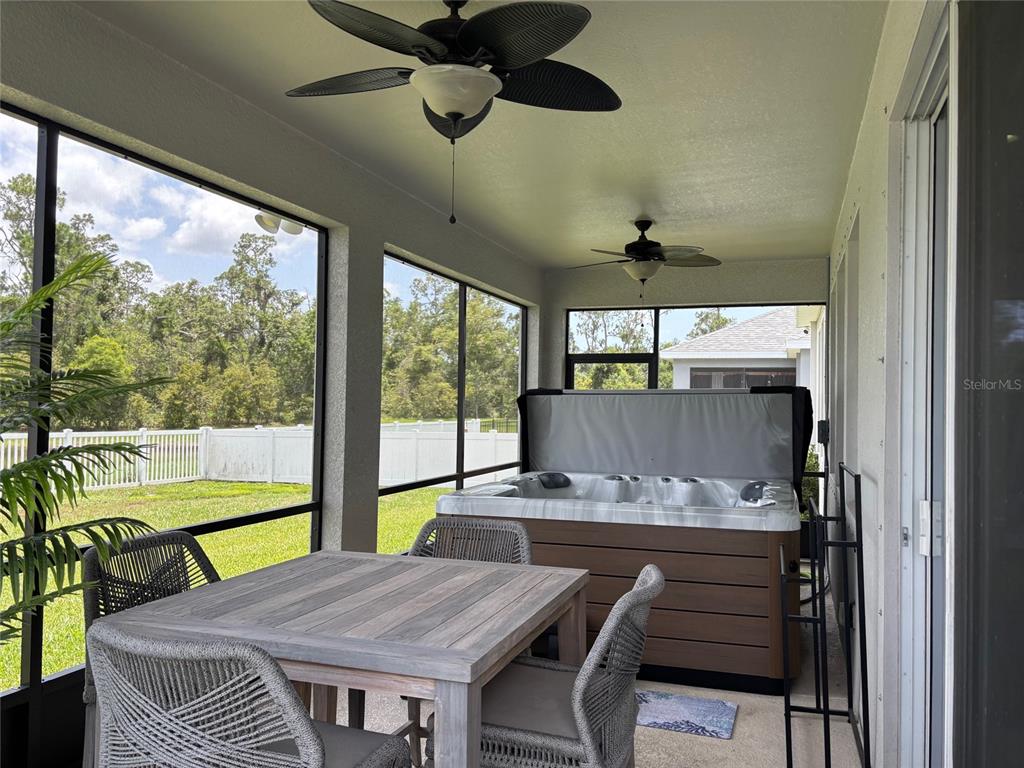 10915 79th Street East Parrish, FL 34219 - Photo 6 of 27 a view of a dining room with furniture window and outside view