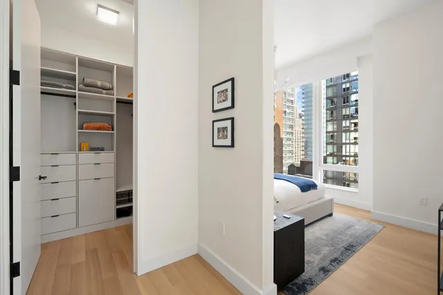 a living room with furniture and a gate