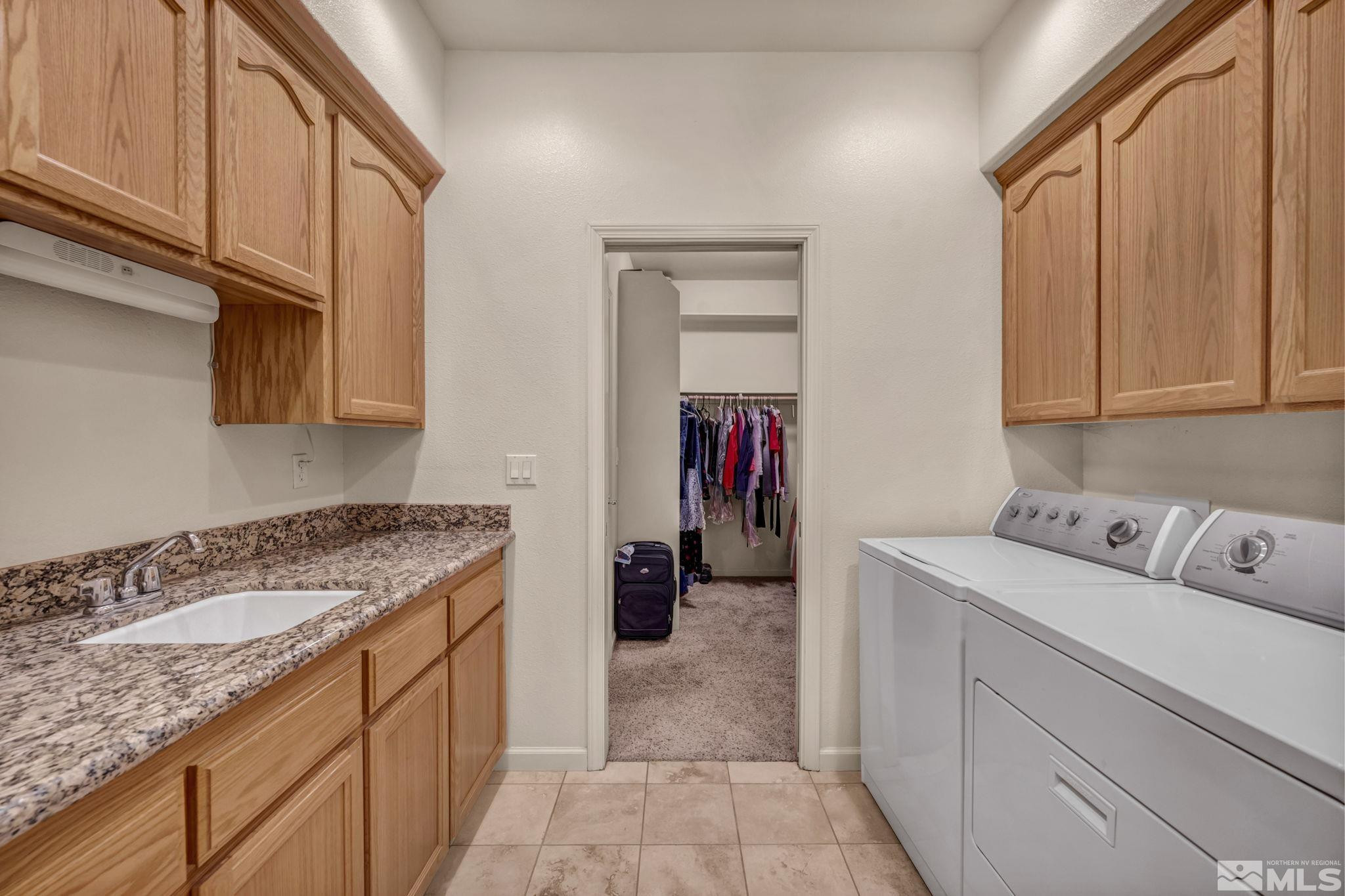 67 Desert View Drive Smith Valley, NV 89430 - Photo 20 of 36 a utility room with cabinets