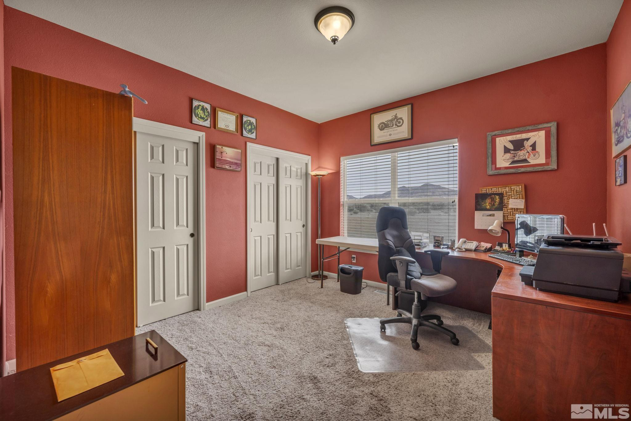 67 Desert View Drive Smith Valley, NV 89430 - Photo 21 of 36 a living room with furniture and a fireplace