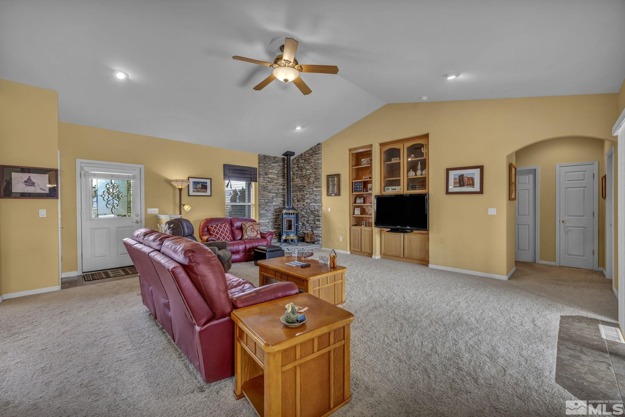 67 Desert View Drive Smith Valley, NV 89430 - Photo 26 of 36 a living room with furniture and a fireplace