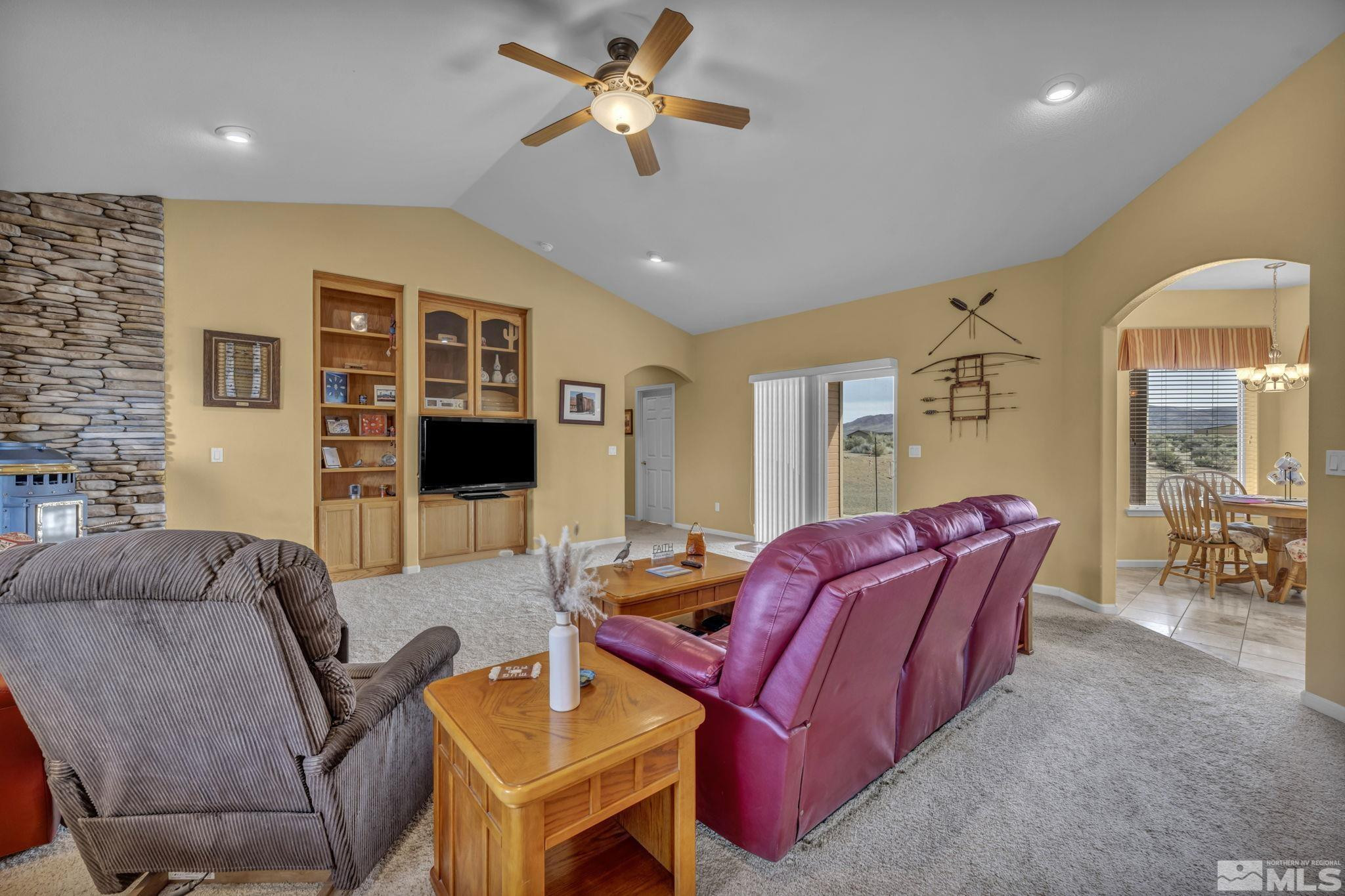 67 Desert View Drive Smith Valley, NV 89430 - Photo 27 of 36 a living room with furniture ceiling fan and a rug