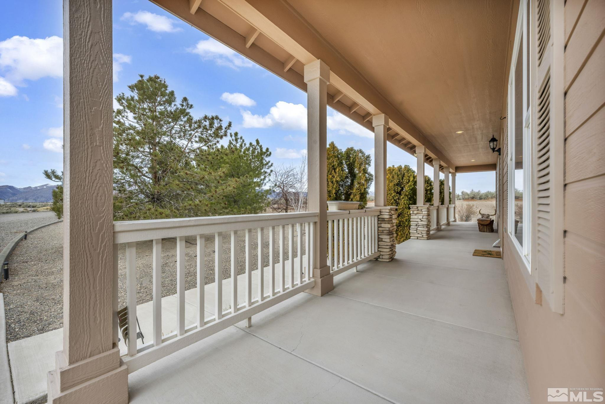 67 Desert View Drive Smith Valley, NV 89430 - Photo 8 of 36 a view of a porch with a floor to ceiling window