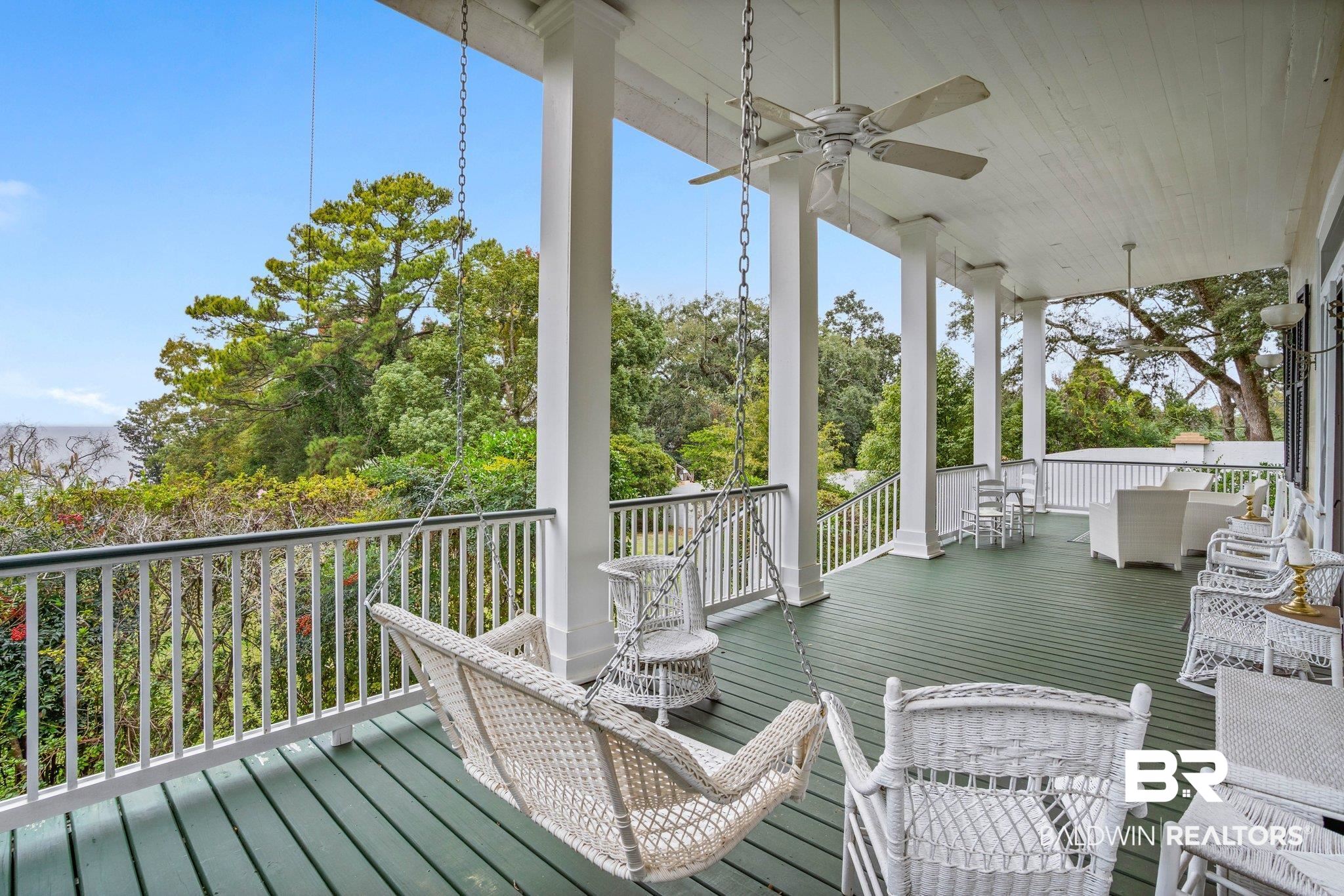 23561 Main Street Fairhope, AL 36532 - Photo 3 of 45 Wooden terrace with a ceiling fan