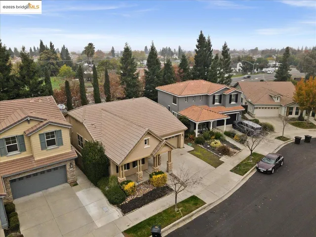 a aerial view of a house with a patio