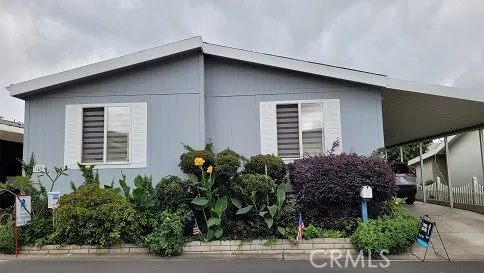 a house that has a potted plant on it