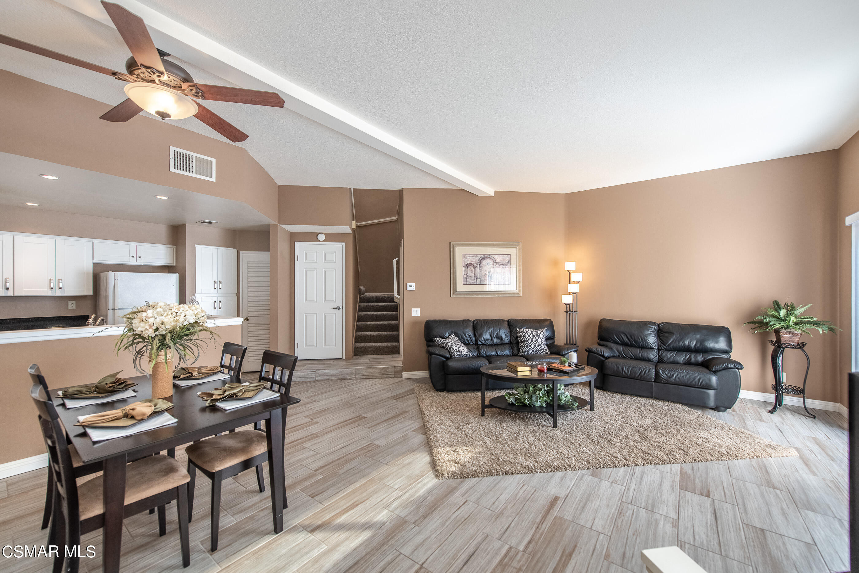 1736 Sinaloa Road, Unit 315 Simi Valley, CA 93065 - Photo 2 of 31 a living room with furniture and a wooden floor