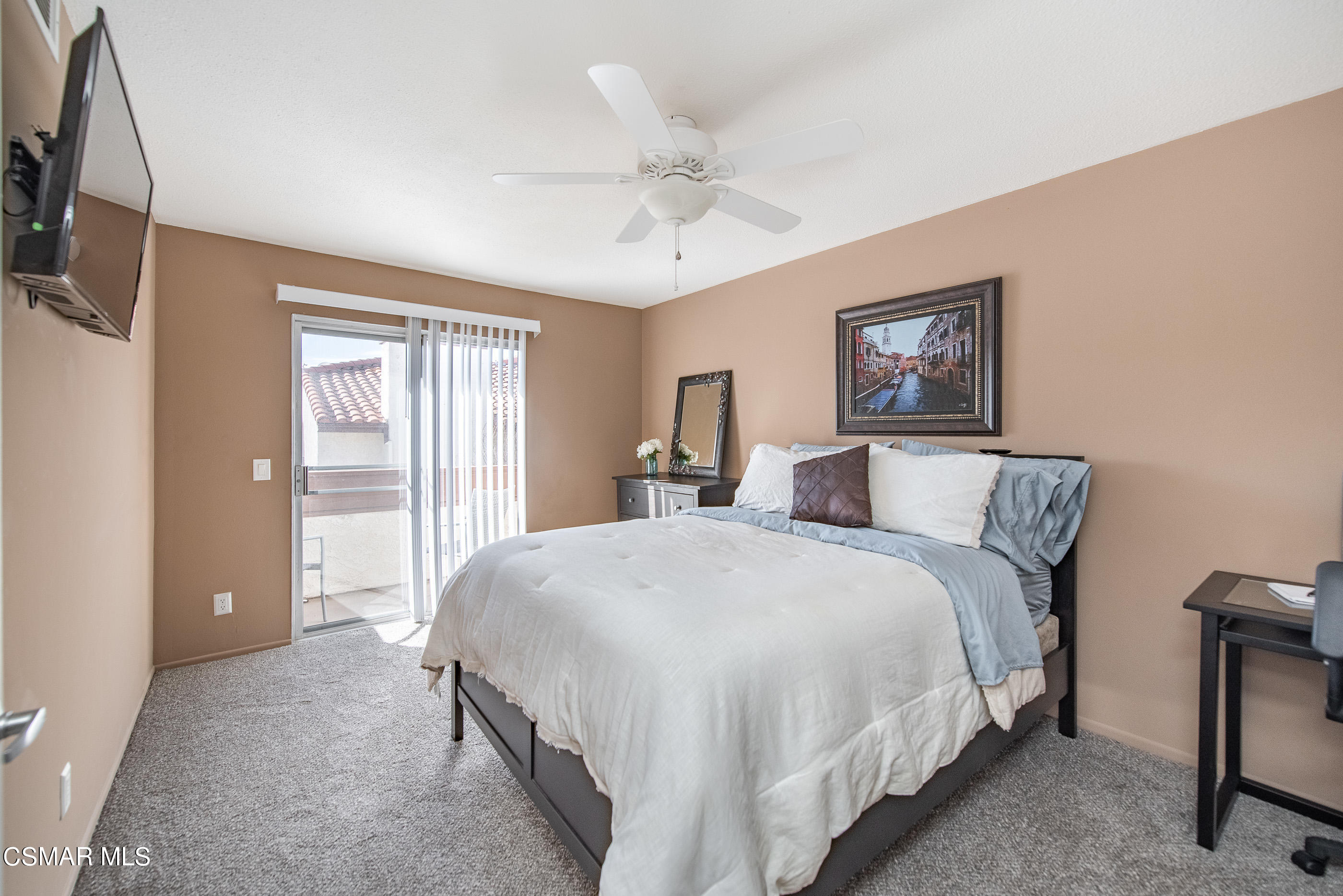 1736 Sinaloa Road, Unit 315 Simi Valley, CA 93065 - Photo 11 of 31 a spacious bedroom with a bed and a chandelier