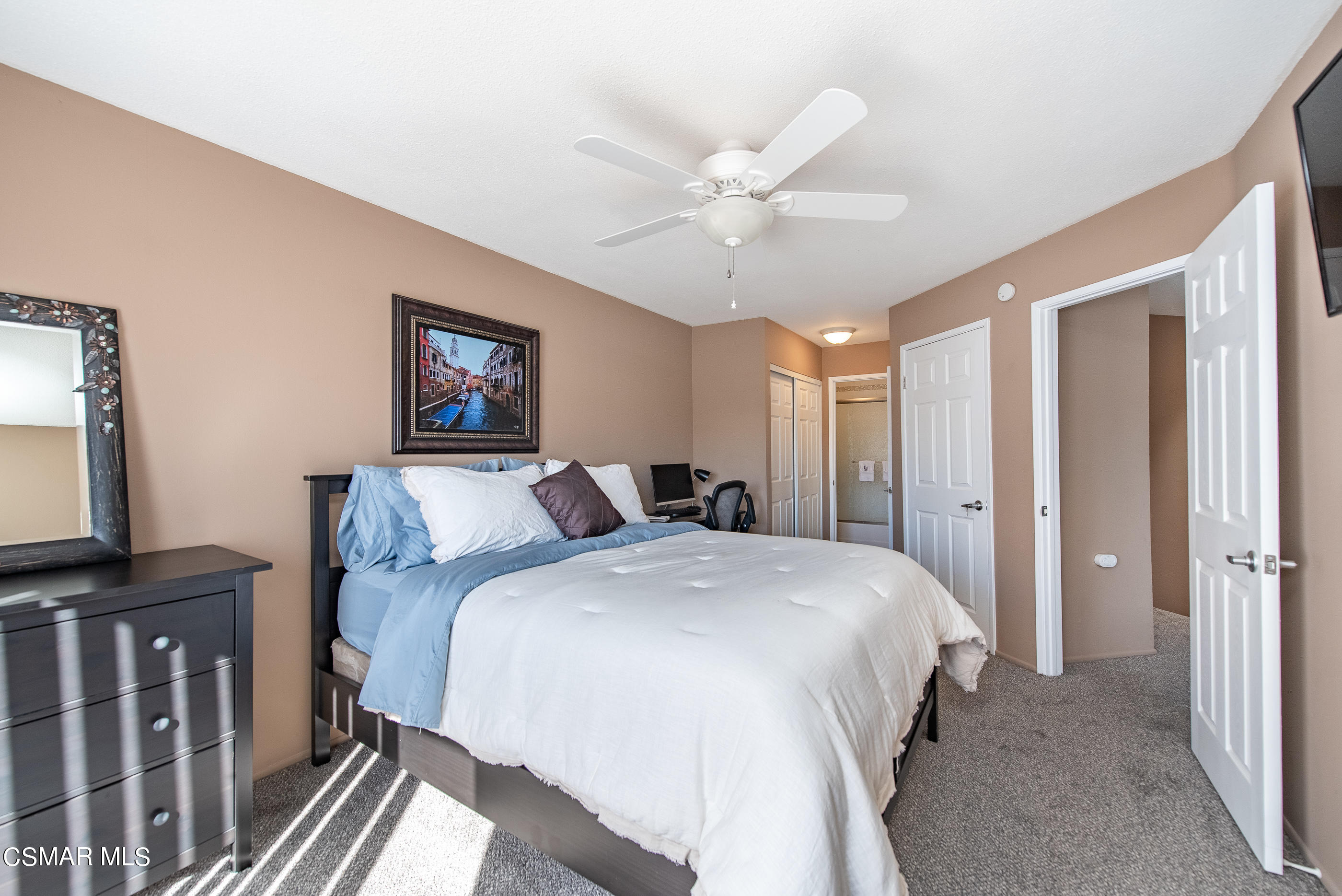 1736 Sinaloa Road, Unit 315 Simi Valley, CA 93065 - Photo 12 of 31 a spacious bedroom with a bed and a flat screen tv