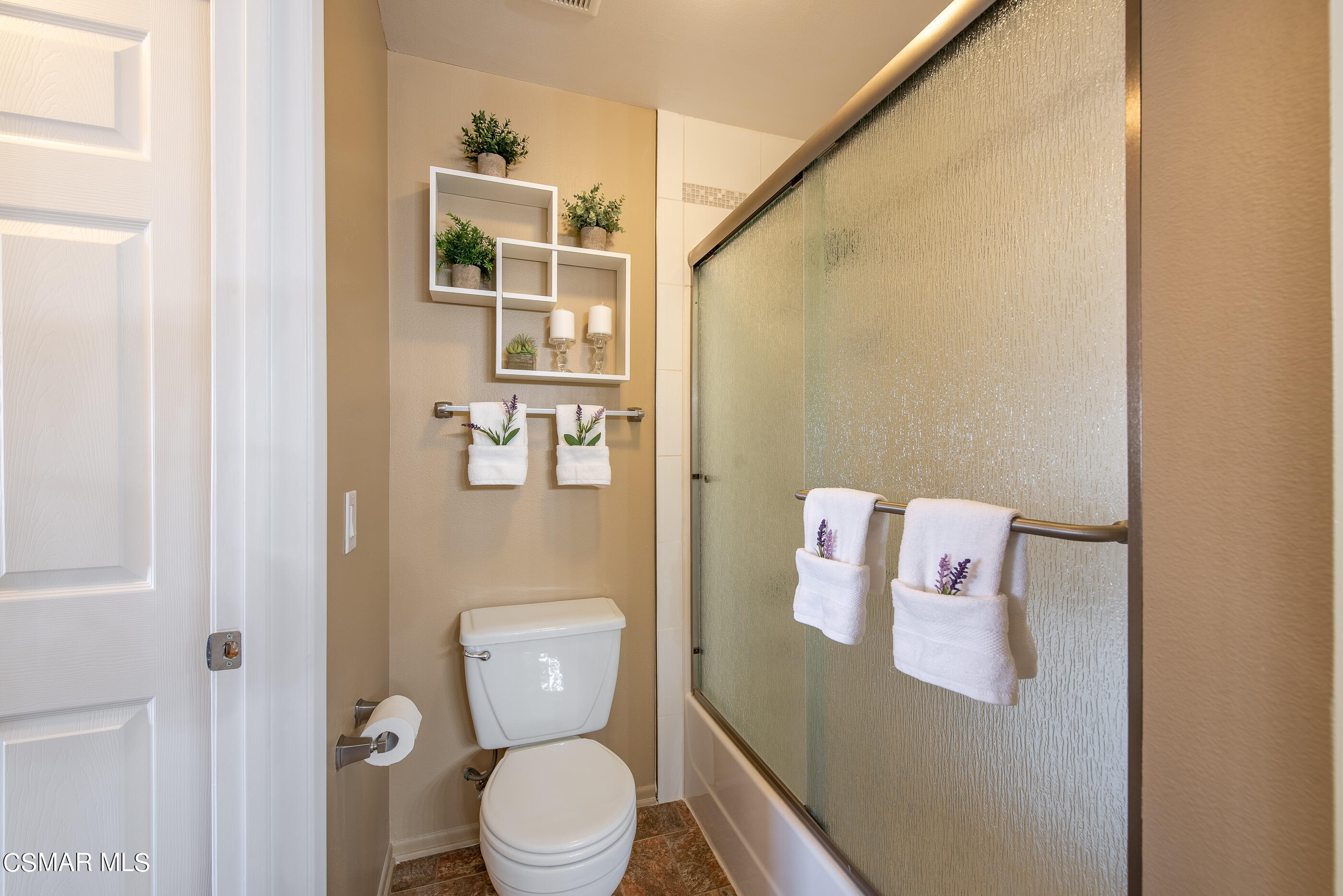 1736 Sinaloa Road, Unit 315 Simi Valley, CA 93065 - Photo 18 of 31 a bathroom with a toilet and a shower