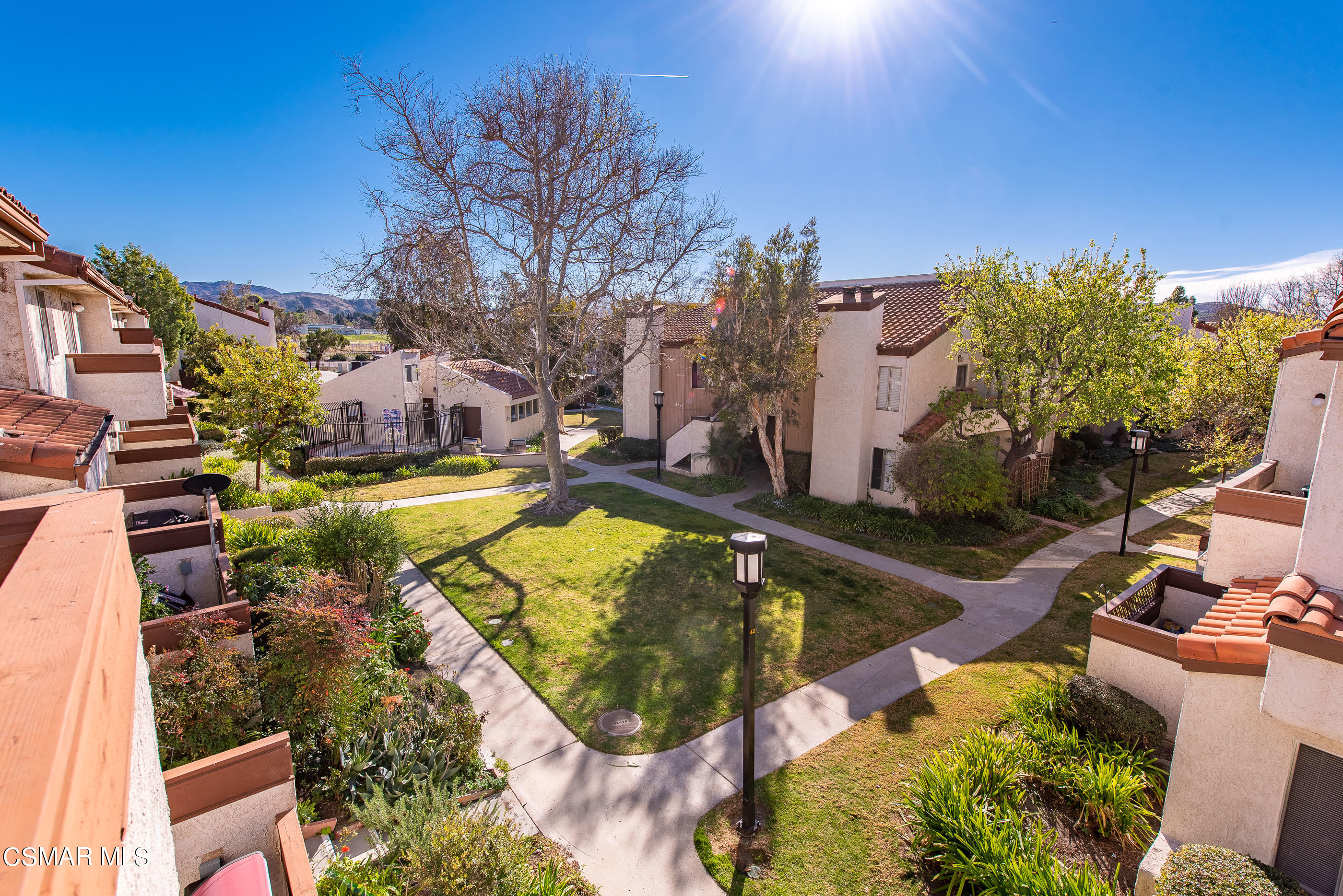 1736 Sinaloa Road, Unit 315 Simi Valley, CA 93065 - Photo 20 of 31 an aerial view of residential houses with outdoor space and swimming pool