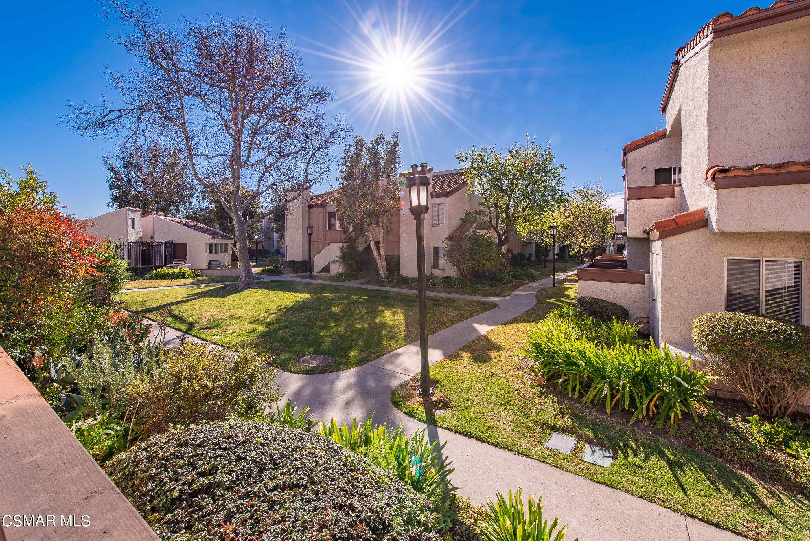 1736 Sinaloa Road, Unit 315 Simi Valley, CA 93065 - Photo 31 of 31 a view of a yard with cars
