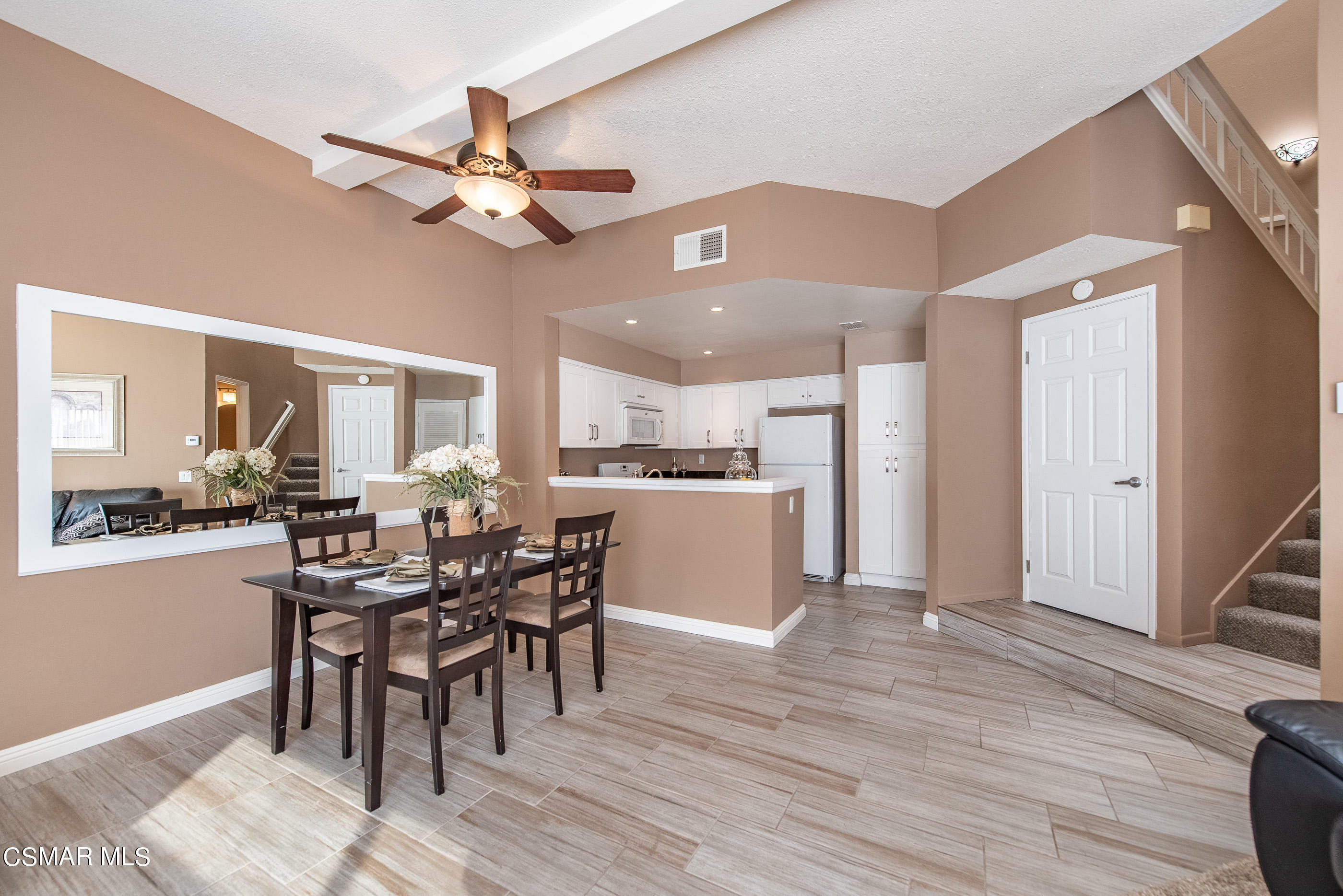 1736 Sinaloa Road, Unit 315 Simi Valley, CA 93065 - Photo 5 of 31 a view of a dining room with furniture and wooden floor