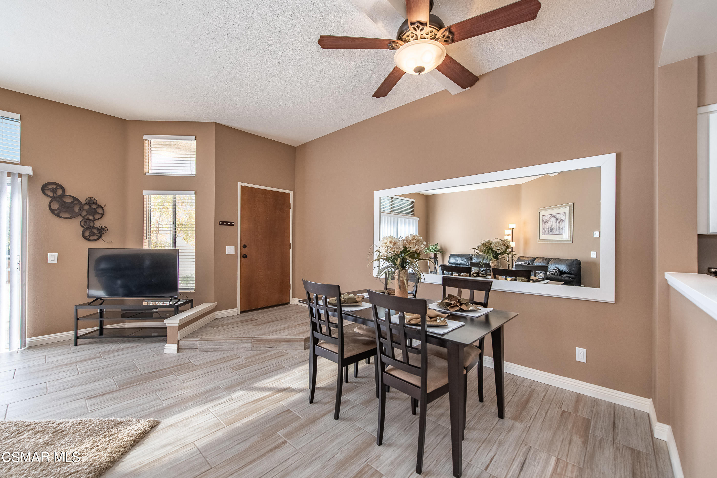 1736 Sinaloa Road, Unit 315 Simi Valley, CA 93065 - Photo 6 of 31 a view of a dining room with furniture window and wooden floor