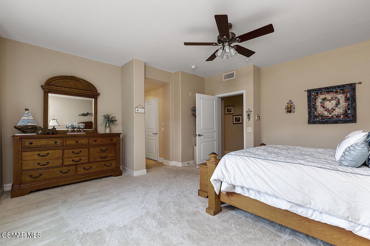 1501 Windshore Way Oxnard, CA 93035 - Photo 14 of 24 a bedroom with a bed and a dresser