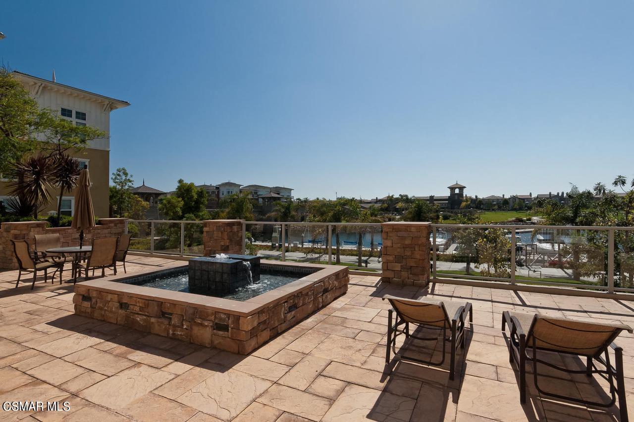 1501 Windshore Way Oxnard, CA 93035 - Photo 19 of 24 a view of a chairs and table on the terrace