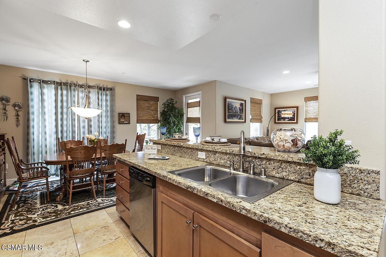1501 Windshore Way Oxnard, CA 93035 - Photo 8 of 24 a kitchen with sink refrigerator and microwave