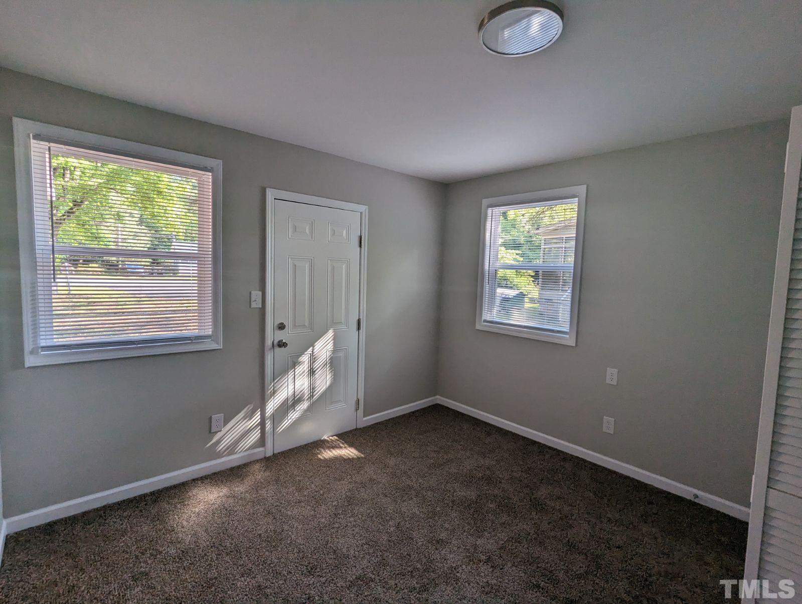 30 Alton Acres Subdivision Road Louisburg, NC 27549 - Photo 17 of 35 a view of empty room with windows