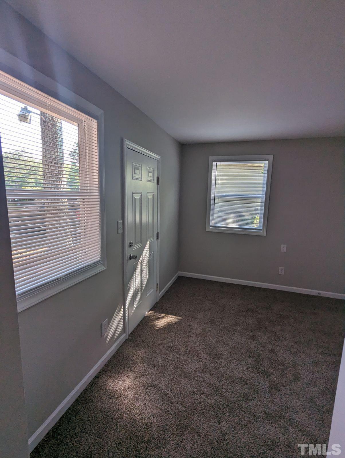 30 Alton Acres Subdivision Road Louisburg, NC 27549 - Photo 18 of 35 a view of an empty room with a window